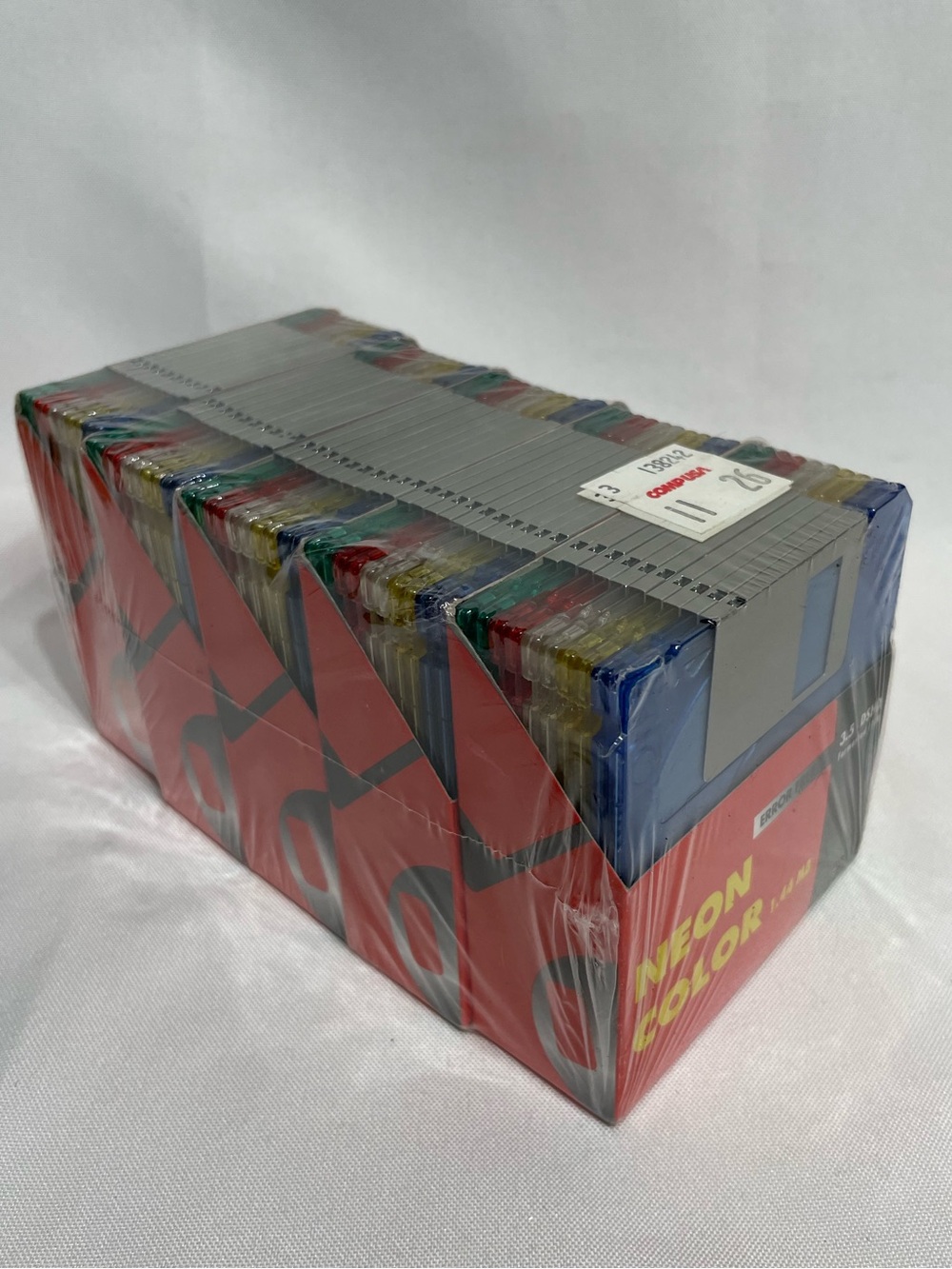 Sealed 50-pack of Error Free branded 3.5-inch floppy disks in neon colors format